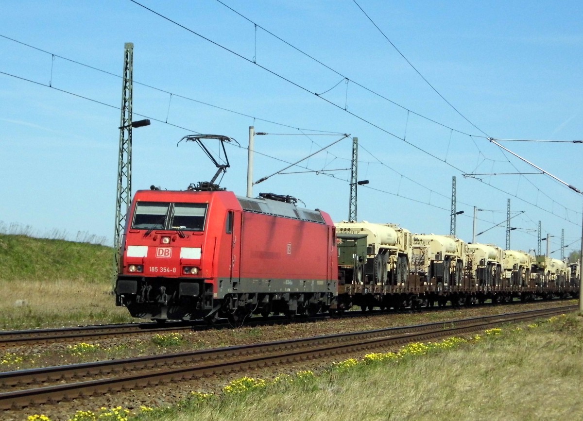 Am 21.04.2015 kam die 185 354-8 von der DB aus der Richtung Stendal nach Demker und fuhr weiter in Richtung Magdeburg .