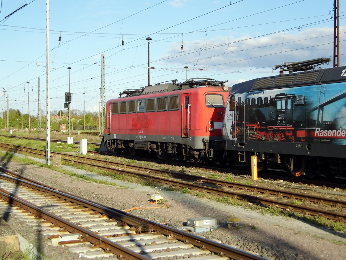 Am 01.05.2015 war die Neue Press 140 047-9 noch in Rot die ex 140 801-2 (RBH 165)in Stendal abgestellt .