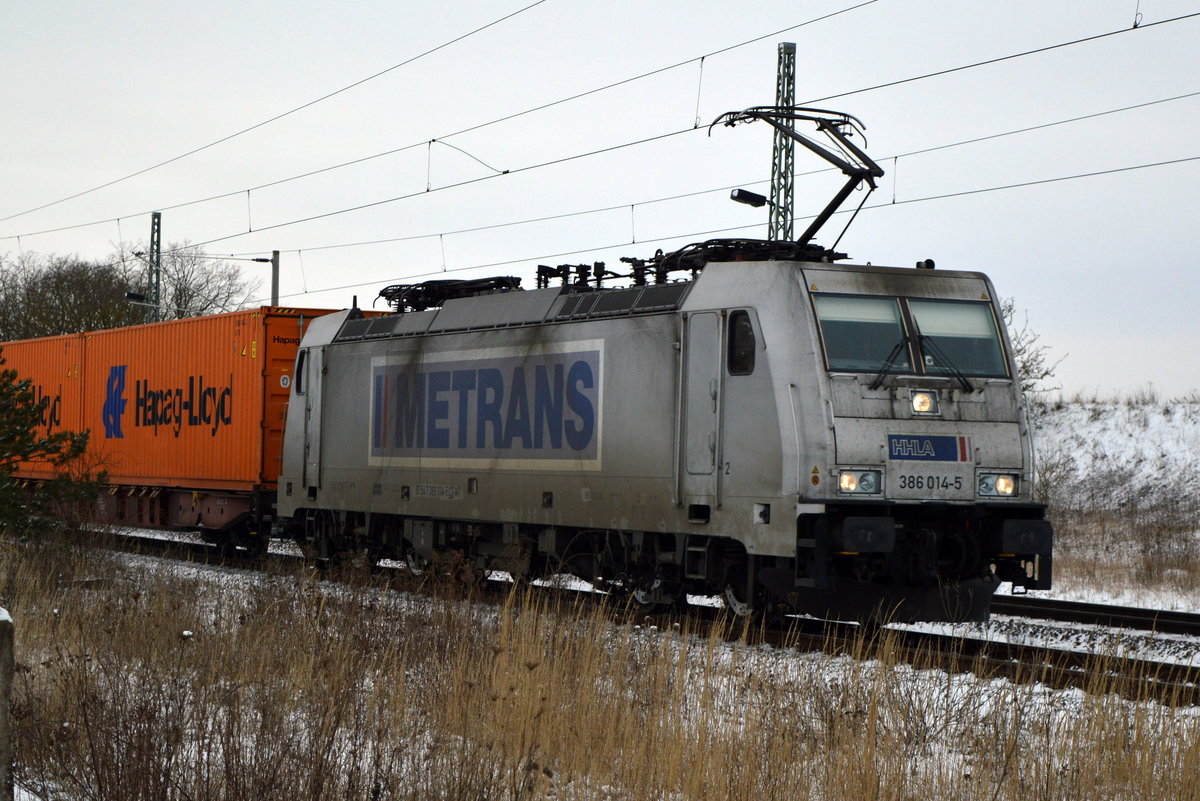 Am 06.02.2021 kam 386 014-5 von METRANS aus der Richtung Magdeburg nach Demker und fuhr weiter in Richtung Stendal .