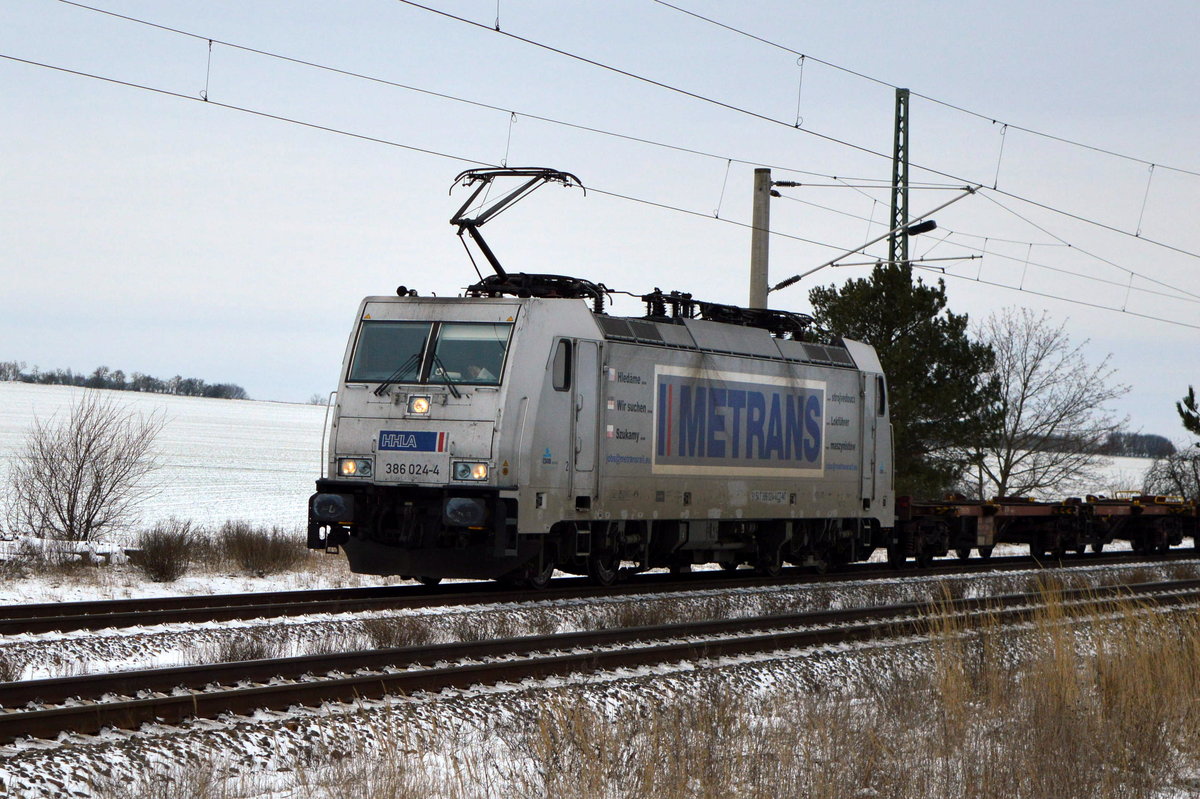 Am 06.02.2021 kam 386 024-4 von METRANS aus der Richtung  Stendal nach Demker  und fuhr weiter in Richtung  Magdeburg .