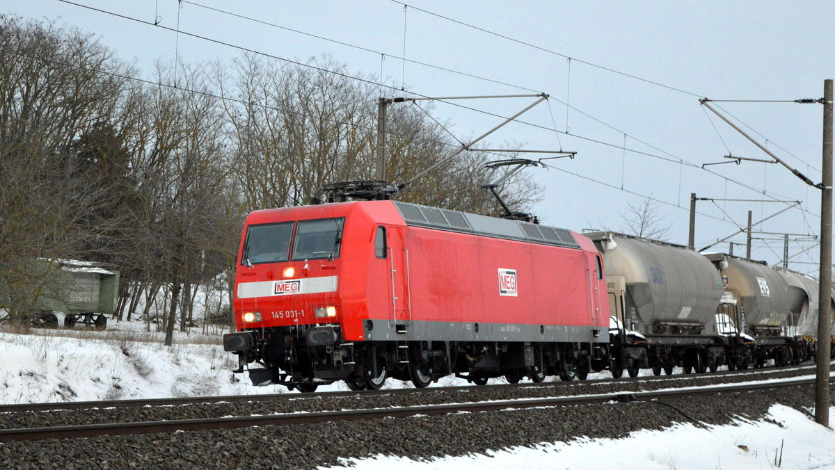 Am 11.02.2021 kam die 145 031-1 von der  MEG - Mitteldeutsche Eisenbahn GmbH,  aus Richtung Stendal und fuhr weiter in Richtung Wittenberge.