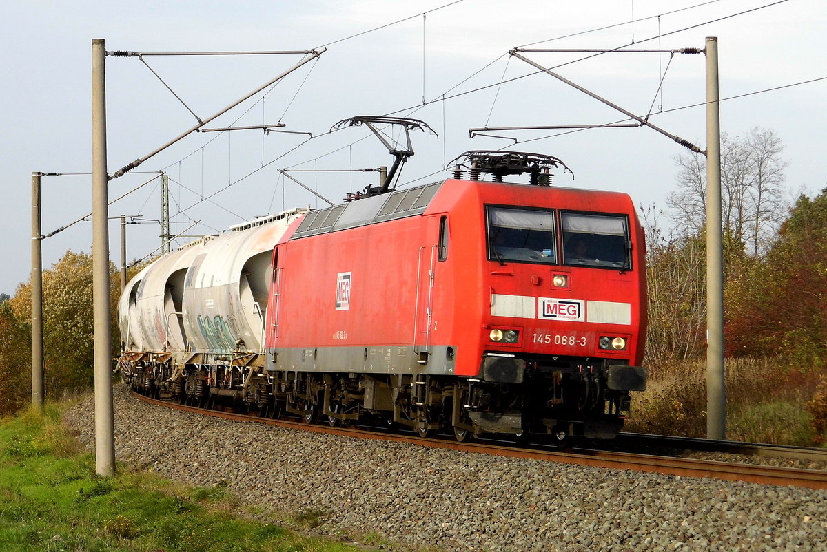 Am 12.11.2020 kam die  145 068-3 von der MEG - Mitteldeutsche Eisenbahn GmbH,  aus Richtung Wittenberge und fuhr weiter in Richtung Stendal .
