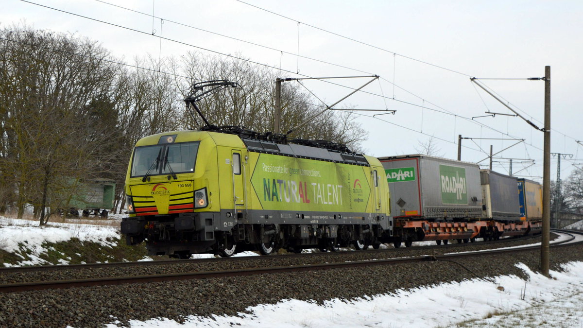 Am 16.02.2021 kam die 193 558-4 von der  TXL - TX Logistik AG,  aus Richtung Stendal und fuhr weiter in Richtung Wittenberge .