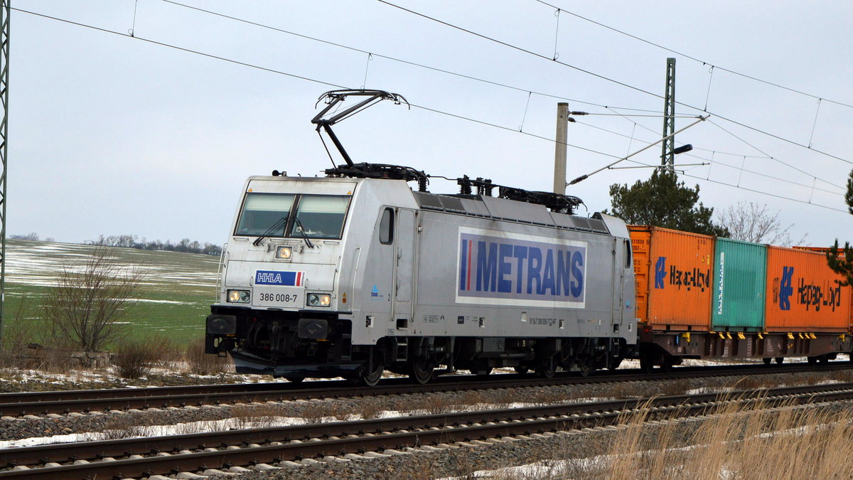 Am 17.02.2021 kam die  386 008-7 von METRANS   aus der Richtung Stendal nach Demker und fuhr weiter in Richtung Magdeburg .