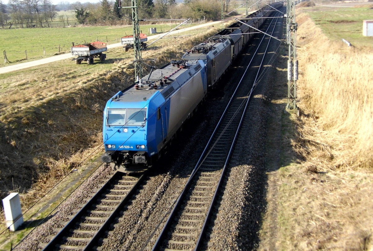 Am 18.03.2015 kamen die 185 520-4   von der CFL Cargo Deutschland GmbH und die 185 566 von der  MRCE dispolok     aus Richtung Hannover und fuhr weiter in Richtung Stendal .